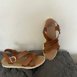 Very comfy low wedge sandals in beige.  Gently worn, size 8.
